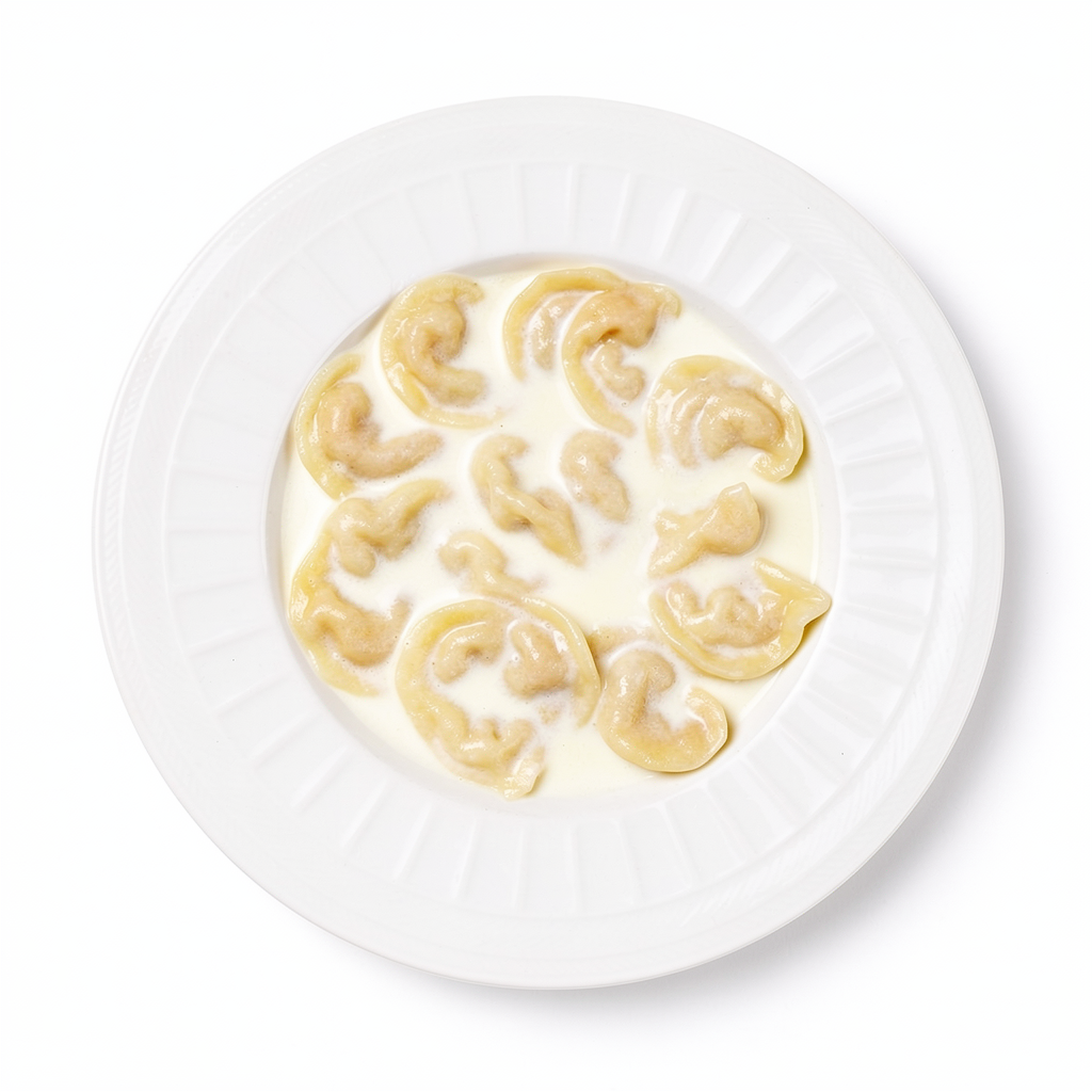 Mleczna zupa z kluskami zwanymi Zacirka